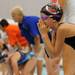 8-year-old Mia Danley of the Milan Swim Club cheers for her teammate competing in heat 8 of the girls 8 and under 100 yard freestyle relay. Angela J. Cesere | AnnArbor.com 