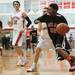 Latin Davis drives the ball to the basket against Temperance Bedford during  the district final game at Temperance Bedford high school Friday Mar. 8th.
Courtney Sacco I AnnArbor.com 