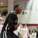 Milan's C.J. Turnage celebrates after dunking the ball against Temperance Bedford during the secound half of the district final game at Temperance Bedford high school Friday Mar. 8th.
Courtney Sacco I AnnArbor.com  