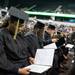 Graduates looks at there degrees after receiving them during WCC's commencement ceremony for the class of 2013 held at the Convocation Center Saturday, May 18.
Courtney Sacco I AnnArbor.com  