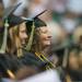 A graduate smiles during WCC's commencement ceremony for the class of 2013 held at the Convocation Center Saturday, May 18.
Courtney Sacco I AnnArbor.com