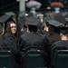 A graduate looks back at the audience during WCC's commencement ceremony for the class of 2013 held at the Convocation Center Saturday, May 18.
Courtney Sacco I AnnArbor.com 