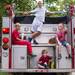 A group of kids hang out on the back of a fire truck as they wait for the start of the Dexter Daze Parade Saturday, August, 10.
Courtney Sacco I AnnArbor.com  