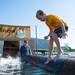 Elijah Ratliff tries to walk on a log during the lumber jack show at the Chelsea Community Fair, Friday, August, 23.
Courtney Sacco I AnnArbor.com  