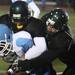 Skyline's Torrey Juide is gang tackled as Ann Arbor Huron took on Ann Arbor Skyline Friday September 30, 2011 at Huron High School. Skyline won the game 28-12. Jeff Sainlar I AnnArbor.com 
