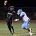 Huron's Alex Hassan releases a pass as Ann Arbor Huron took on Ann Arbor Skyline Friday September 30, 2011 at Huron High School. Skyline won the game 28-12. Jeff Sainlar I AnnArbor.com 
