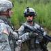 Neil Gikas, 26, of Pittsfield Township near Ann Arbor, and Drew Cummings, 25, talk about a training exercise at Camp Grayling on Sept. 24, 2011. Gikas is a lieutenant in charge of a platoon within Saginaw-based Bravo Company, one of six companies of the Michigan National Guard 1st Battalion, 125th Infantry Unit. The combat unit's call sign is the Viking Battalion; it is headquartered in Flint, Mich.